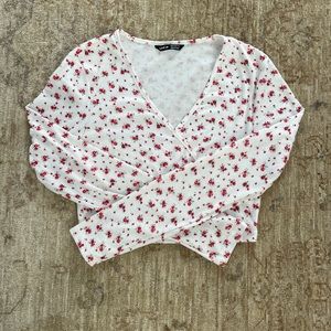 The cutest little floral faux top. Size small by Shein.